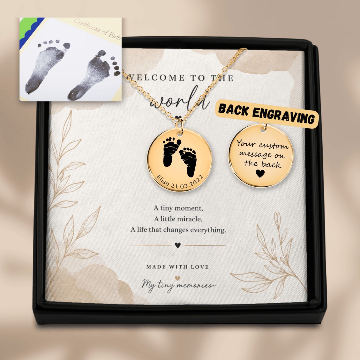 Gold necklace with baby footprints and customizable message card in a decorative box.