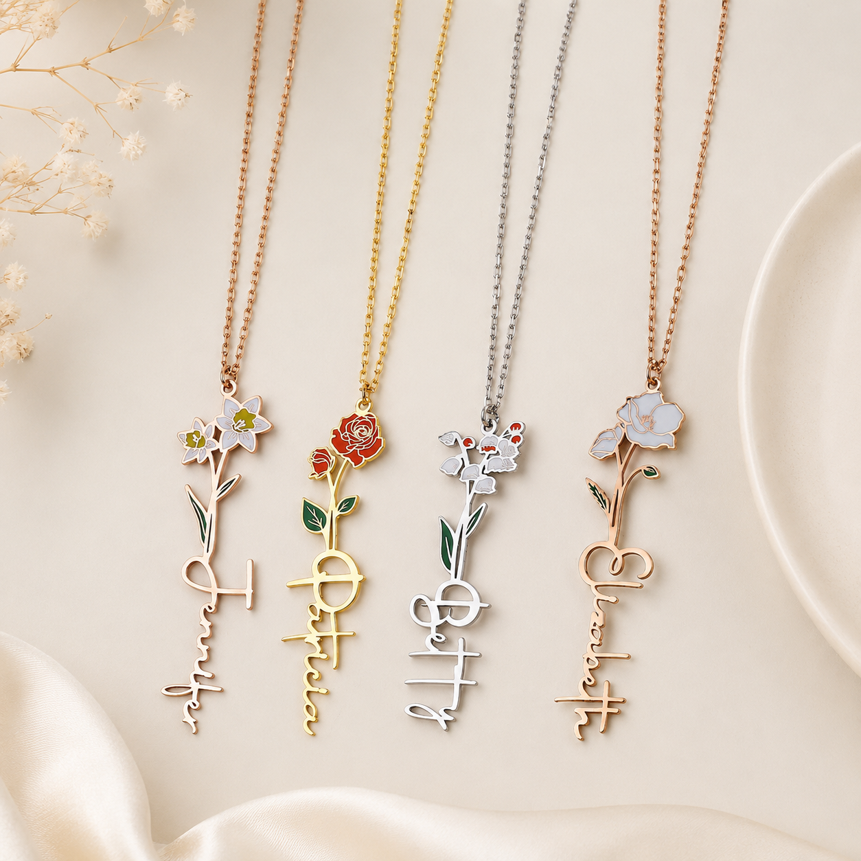 Five floral necklaces with different designs on a light background