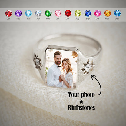 Personalized ring with photo and birthstones on a textured surface