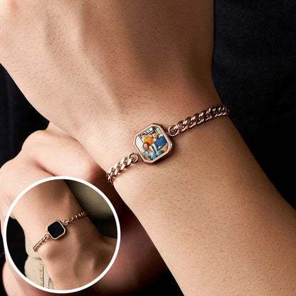 Rose gold bracelet with a decorative clasp on a wrist, with a close-up inset showing the clasp detail.