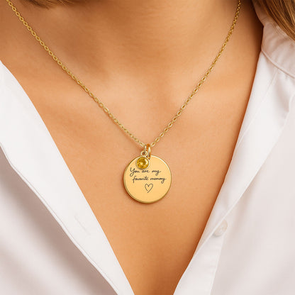 Woman wearing personalized You Are My Favorite Memory engraved birthstone necklace in gold finish