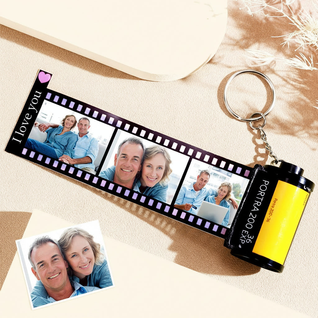 Keychain with film strip design featuring photos of a couple and text 'I Love You' on a pink background.